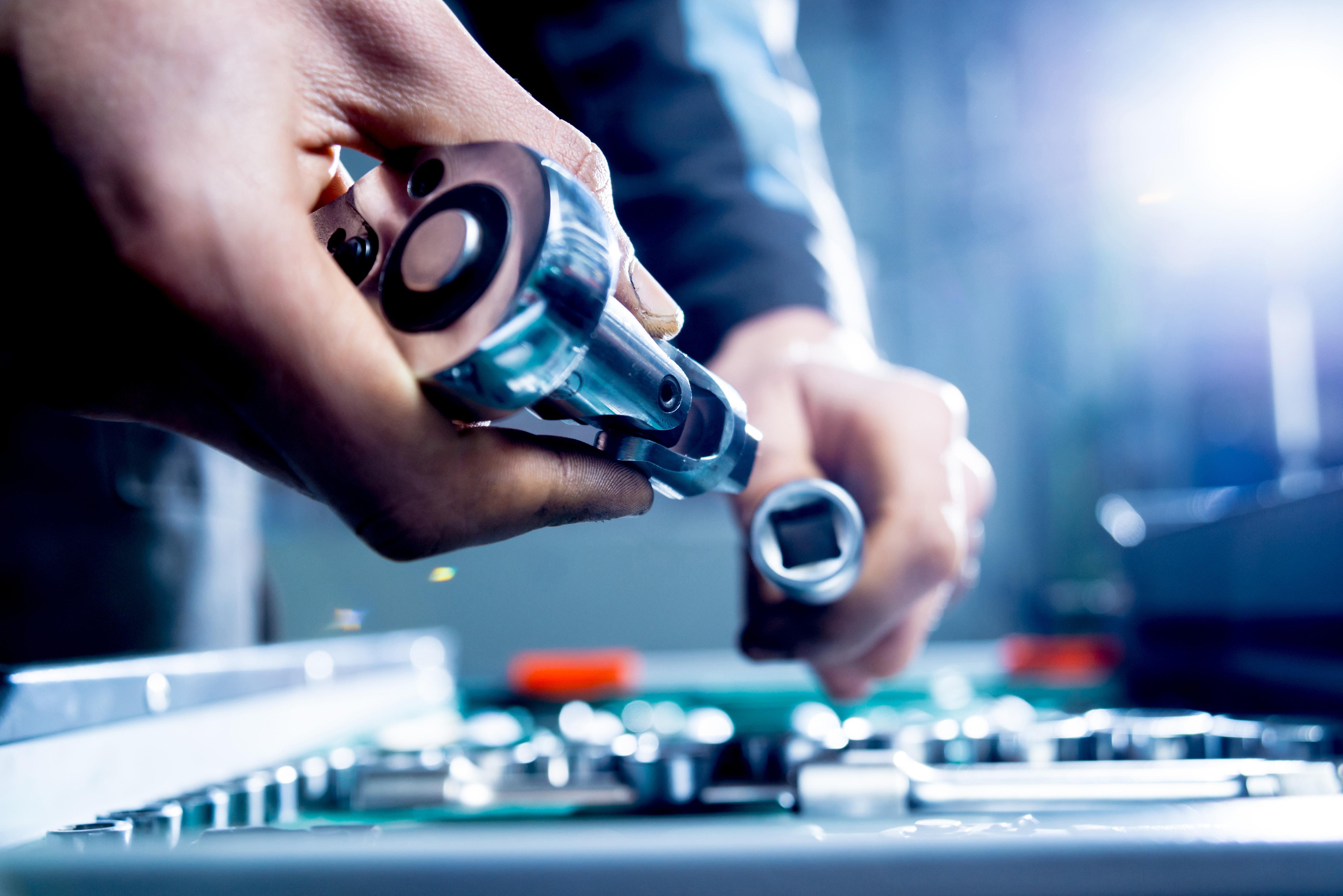 Tools at the hands. Auto repair